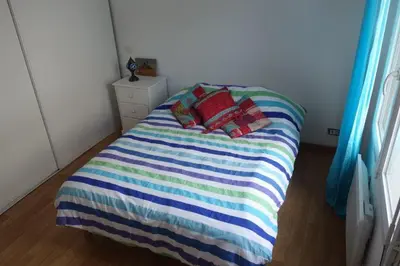 Un ou plusieurs lits dans un hébergement de l'établissement Villa bleue