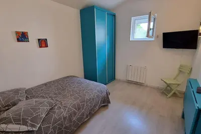Un ou plusieurs lits dans un hébergement de l'établissement Villa bleue