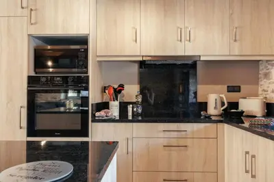 Cuisine ou kitchenette dans l'établissement Le domaine de La Combarsou