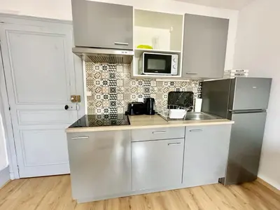 Cuisine ou kitchenette dans l'établissement Le Saint Georges, cosy et calme