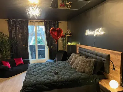 Coin salon dans l'établissement Douce Folie romantique