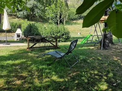 Jardin de l'établissement Charmant gîte de montagne avec cheminée
