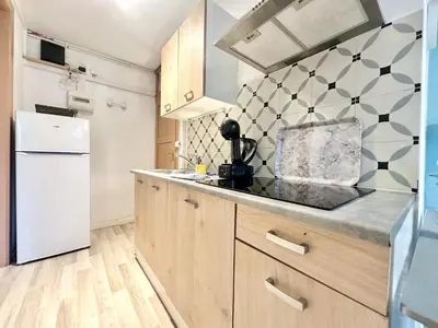 Cuisine ou kitchenette dans l'établissement Le Guillaumin, convivial et zen
