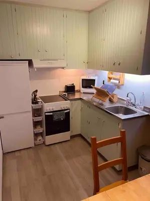 Cuisine ou kitchenette dans l'établissement Appartement 4-6 pers - La Bourboule