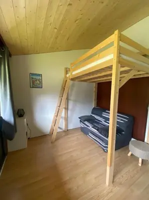 Un ou plusieurs lits dans un hébergement de l'établissement Appartement 4-6 pers - La Bourboule