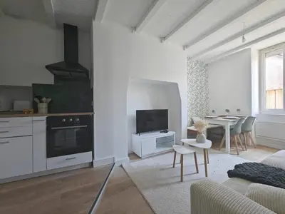 Télévision ou salle de divertissement dans l'établissement Le Stadium, coconning et design