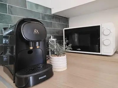 Cuisine ou kitchenette dans l'établissement Le Stadium, coconning et design