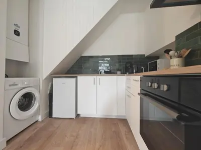Cuisine ou kitchenette dans l'établissement Le Stadium, coconning et design