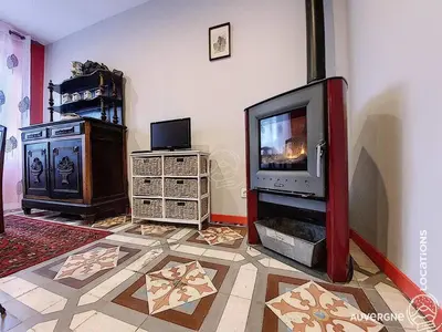 Télévision ou salle de divertissement dans l'établissement Le Wollo