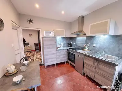 Cuisine ou kitchenette dans l'établissement Le Wollo