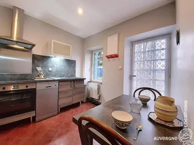 Cuisine ou kitchenette dans l'établissement Le Wollo