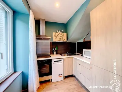 Cuisine ou kitchenette dans l'établissement Le Combolcha