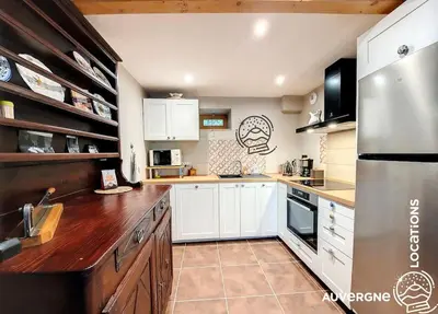 Cuisine ou kitchenette dans l'établissement Le Cantou de La Mouche
