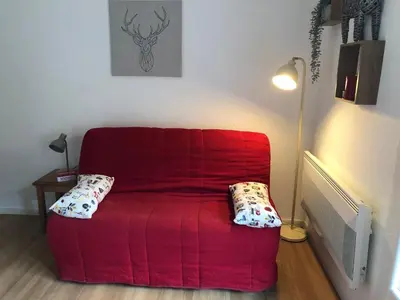 Coin salon dans l'établissement SUPER BESSE station LE GITE BESSARD 2 quartier bois de la reine 5 couchages