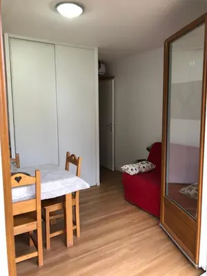 Un ou plusieurs lits dans un hébergement de l'établissement SUPER BESSE station LE GITE BESSARD 2 quartier bois de la reine 5 couchages
