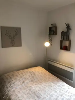 Un ou plusieurs lits dans un hébergement de l'établissement SUPER BESSE station LE GITE BESSARD 2 quartier bois de la reine 5 couchages