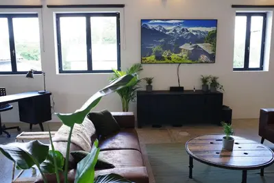 Coin salon dans l'établissement Loft au cœur des volcans d'auvergne