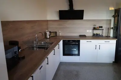 Cuisine ou kitchenette dans l'établissement Loft au cœur des volcans d'auvergne