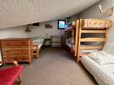 Un ou plusieurs lits dans un hébergement de l'établissement Duplex T3 balcon au cœur du Lioran, proche pistes - FR-1-787-89