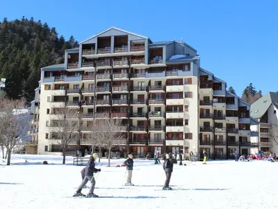 L'établissement Duplex T3 balcon au cœur du Lioran, proche pistes - FR-1-787-89 en hiver