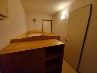 Un ou plusieurs lits dans un hébergement de l'établissement Studio cabine avec balcon sud-est au Lioran - FR-1-787-100