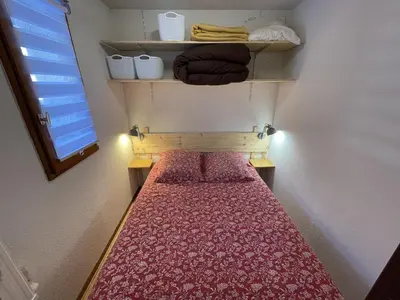 Un ou plusieurs lits dans un hébergement de l'établissement Confort au cœur de Le Lioran : T2 avec balcon - FR-1-787-97