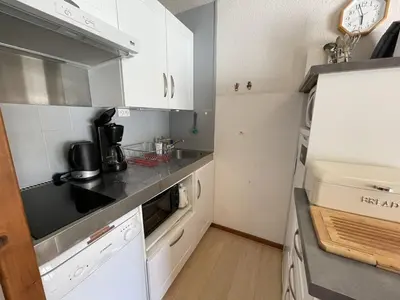 Cuisine ou kitchenette dans l'établissement Confort au cœur de Le Lioran : T2 avec balcon - FR-1-787-97