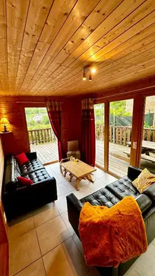 Coin salon dans l'établissement Chalet Le Salers 10pers Le Mont Dore