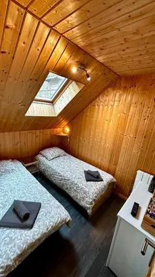 Un ou plusieurs lits dans un hébergement de l'établissement Chalet Le Salers 10pers Le Mont Dore