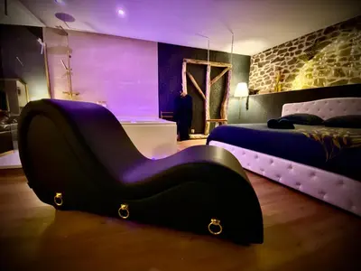 Un ou plusieurs lits dans un hébergement de l'établissement Love Room Plaisir Secret