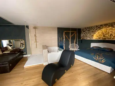 Un ou plusieurs lits dans un hébergement de l'établissement Love Room Plaisir Secret