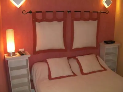 Un ou plusieurs lits dans un hébergement de l'établissement Appartement à la montagne