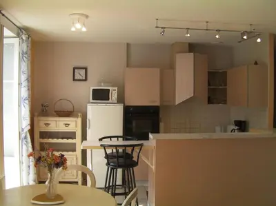 Cuisine ou kitchenette dans l'établissement Appartement à la montagne