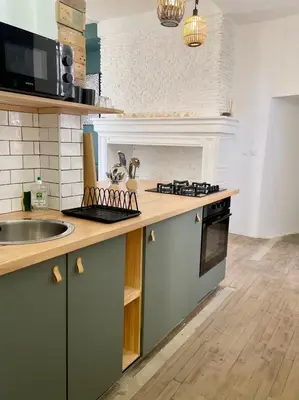 Cuisine ou kitchenette dans l'établissement Appart centre historique Tulle
