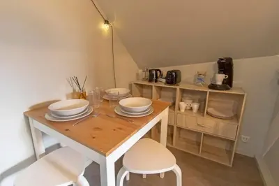 Cuisine ou kitchenette dans l'établissement La haute république
