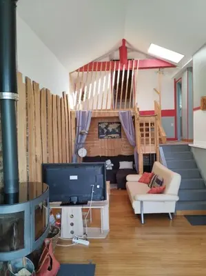 Coin salon dans l'établissement Gîte paisible en bord de lac