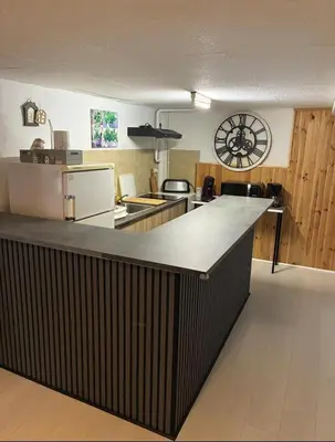 Cuisine ou kitchenette dans l'établissement Location appartement - Le Mont Dore