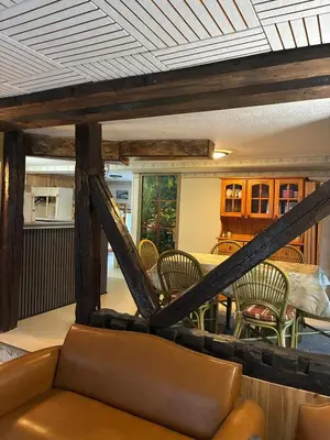 Coin salon dans l'établissement Location appartement - Le Mont Dore