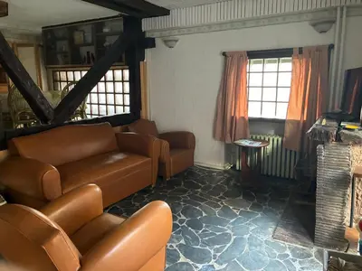 Coin salon dans l'établissement Location appartement - Le Mont Dore