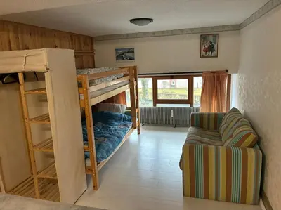 Un ou plusieurs lits dans un hébergement de l'établissement Location appartement - Le Mont Dore