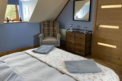Un ou plusieurs lits dans un hébergement de l'établissement Converted Barn