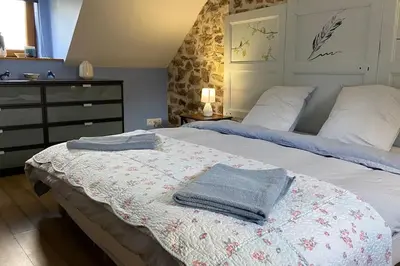 Un ou plusieurs lits dans un hébergement de l'établissement Converted Barn