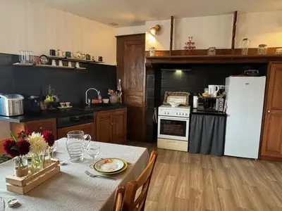 Cuisine ou kitchenette dans l'établissement Gîte La Belle du Clocher