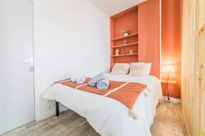 Un ou plusieurs lits dans un hébergement de l'établissement Le Boheme Terracotta - Proche du centre hospitalier
