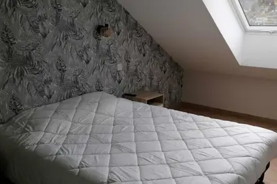 Un ou plusieurs lits dans un hébergement de l'établissement Appartement neuf dans Résidence