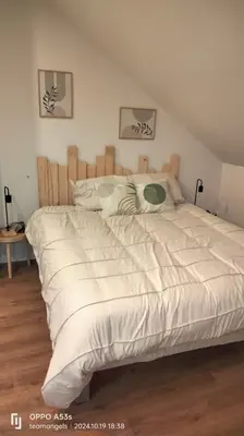 Un ou plusieurs lits dans un hébergement de l'établissement chalets du massif du Sancy