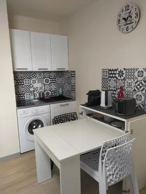 Cuisine ou kitchenette dans l'établissement Studio 2 - Mont Dore face aux Thermes - Hyper-Centre