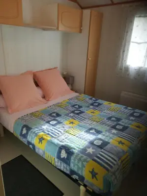 Un ou plusieurs lits dans un hébergement de l'établissement Chalet N 22