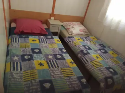Un ou plusieurs lits dans un hébergement de l'établissement Chalet N 22