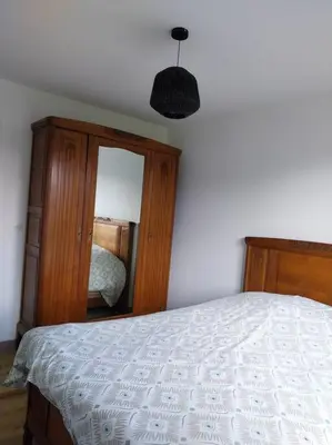 Un ou plusieurs lits dans un hébergement de l'établissement Maison plain-pied